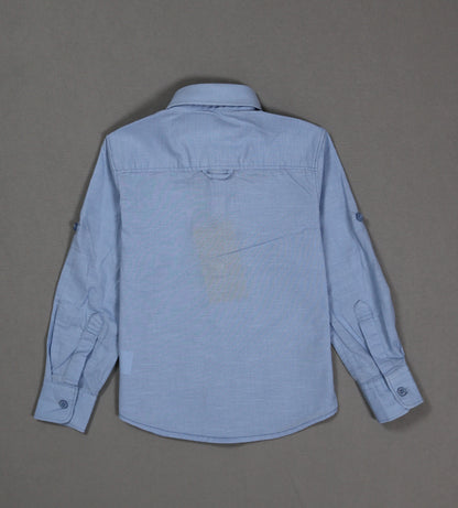 Blue shirt on a gray background