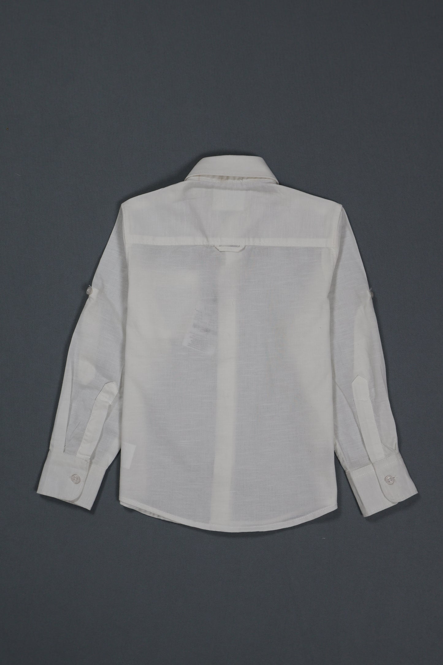 White shirt on a dark gray background