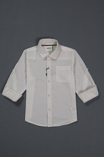 White shirt with rolled-up sleeves on a gray background