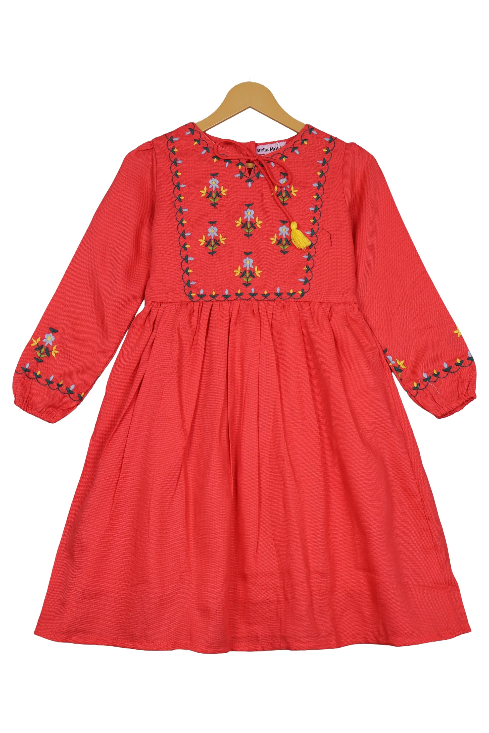 Crimson red cotton frock for girls with floral embroidery and long sleeves, displayed on hanger