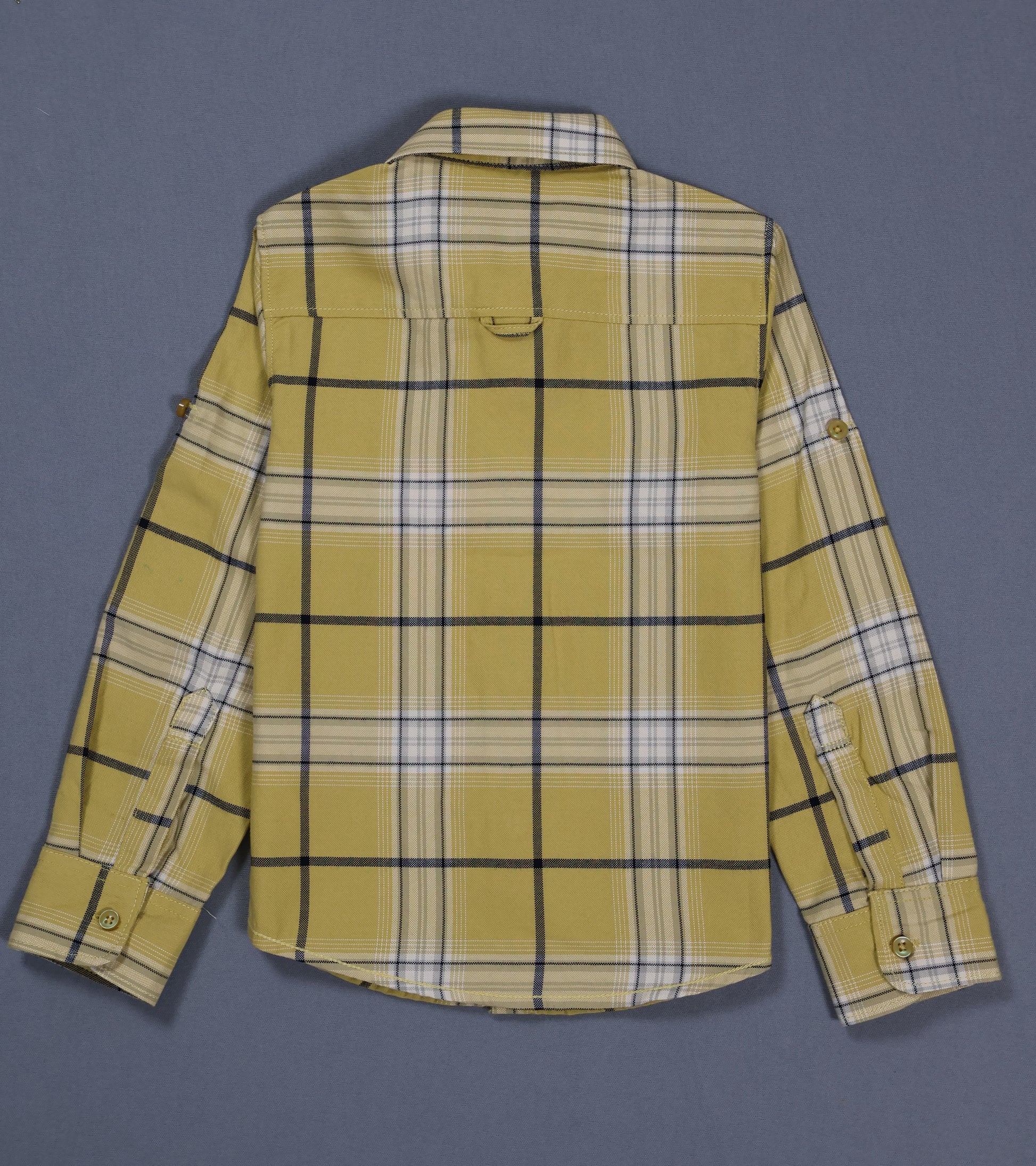 Yellow plaid shirt on a gray background