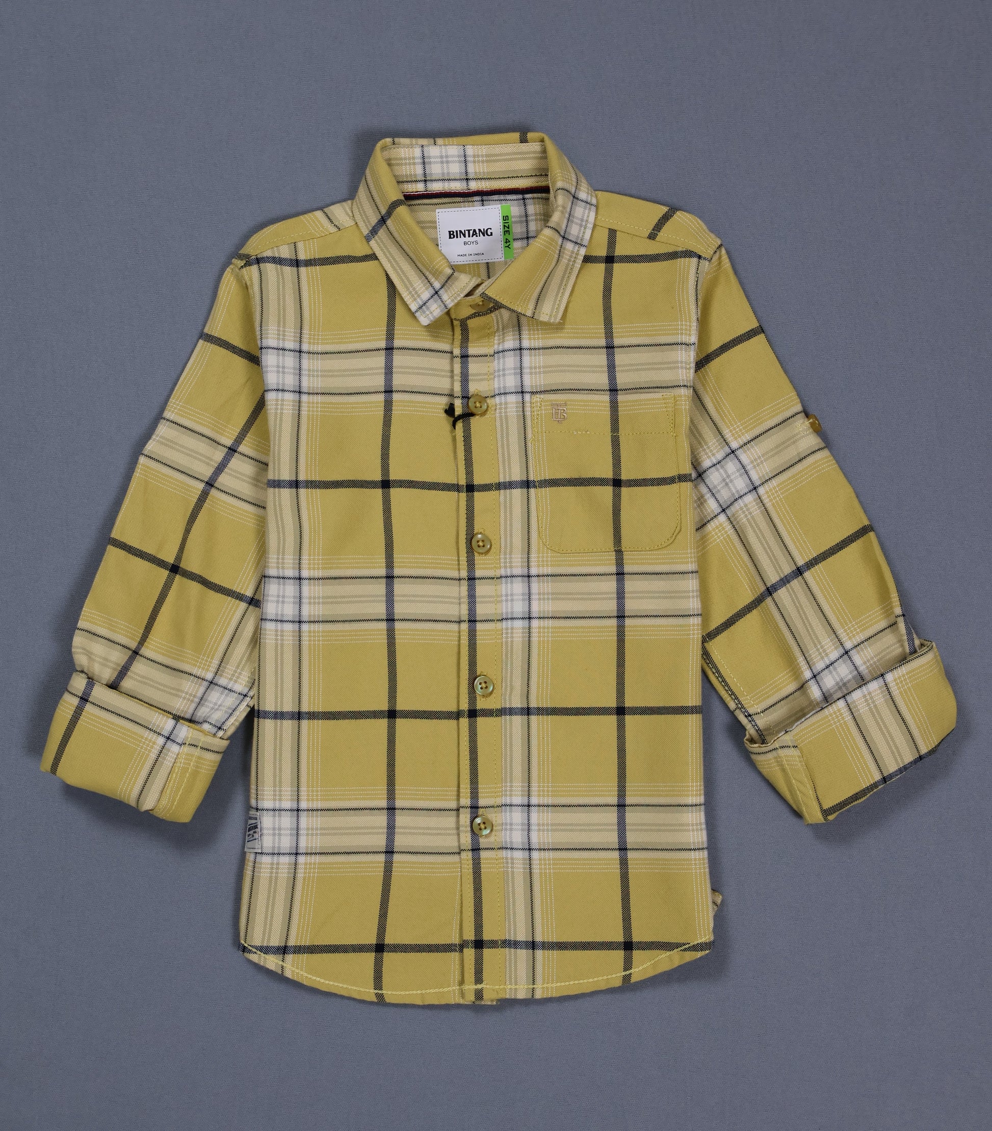Yellow plaid shirt on a gray background