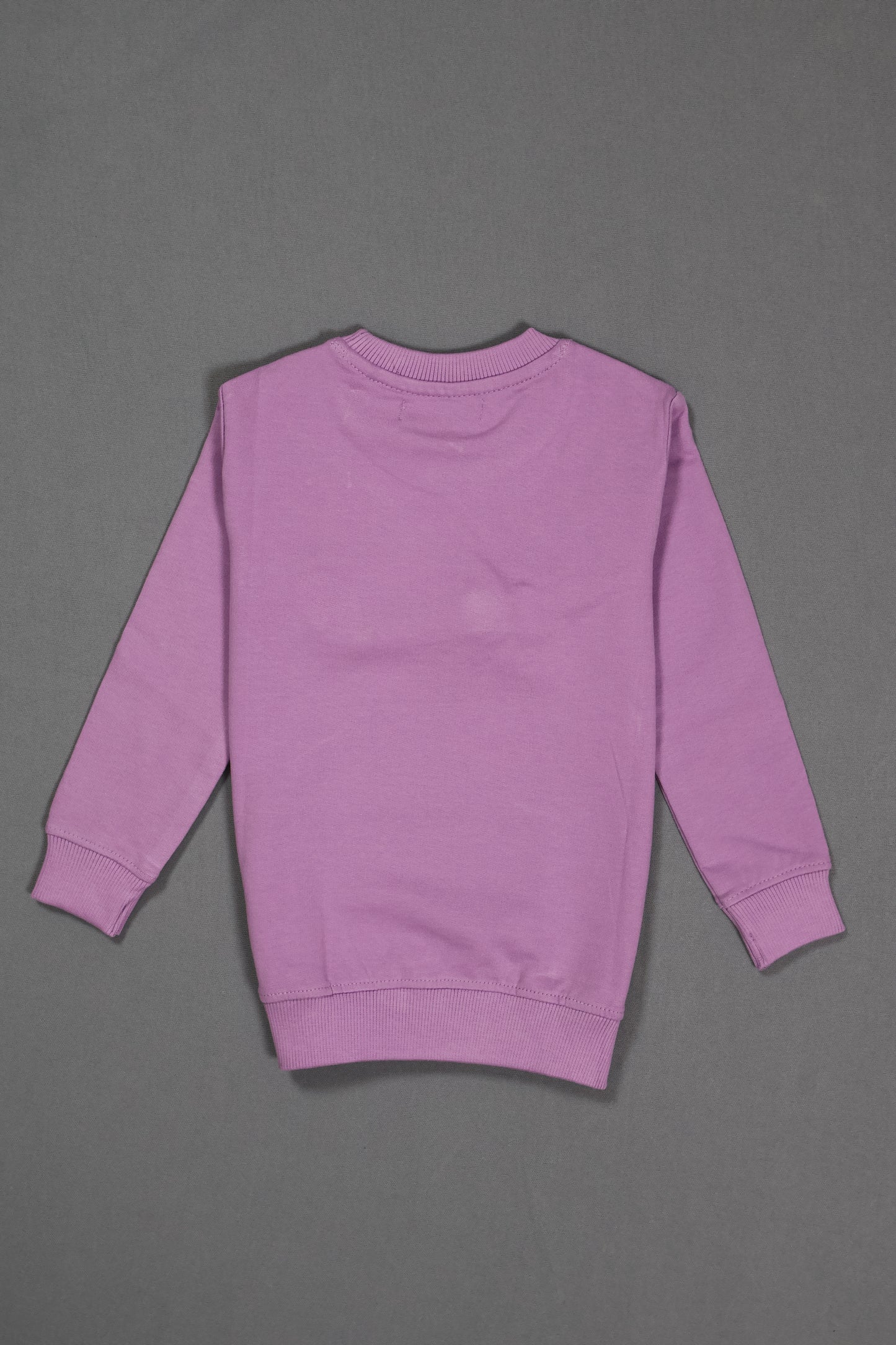 Back view of a plain purple cotton kids sweatshirt with long sleeves on grey background