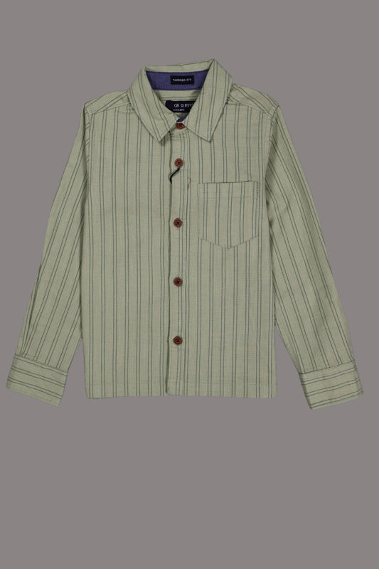 Green striped shirt with brown buttons on a gray background