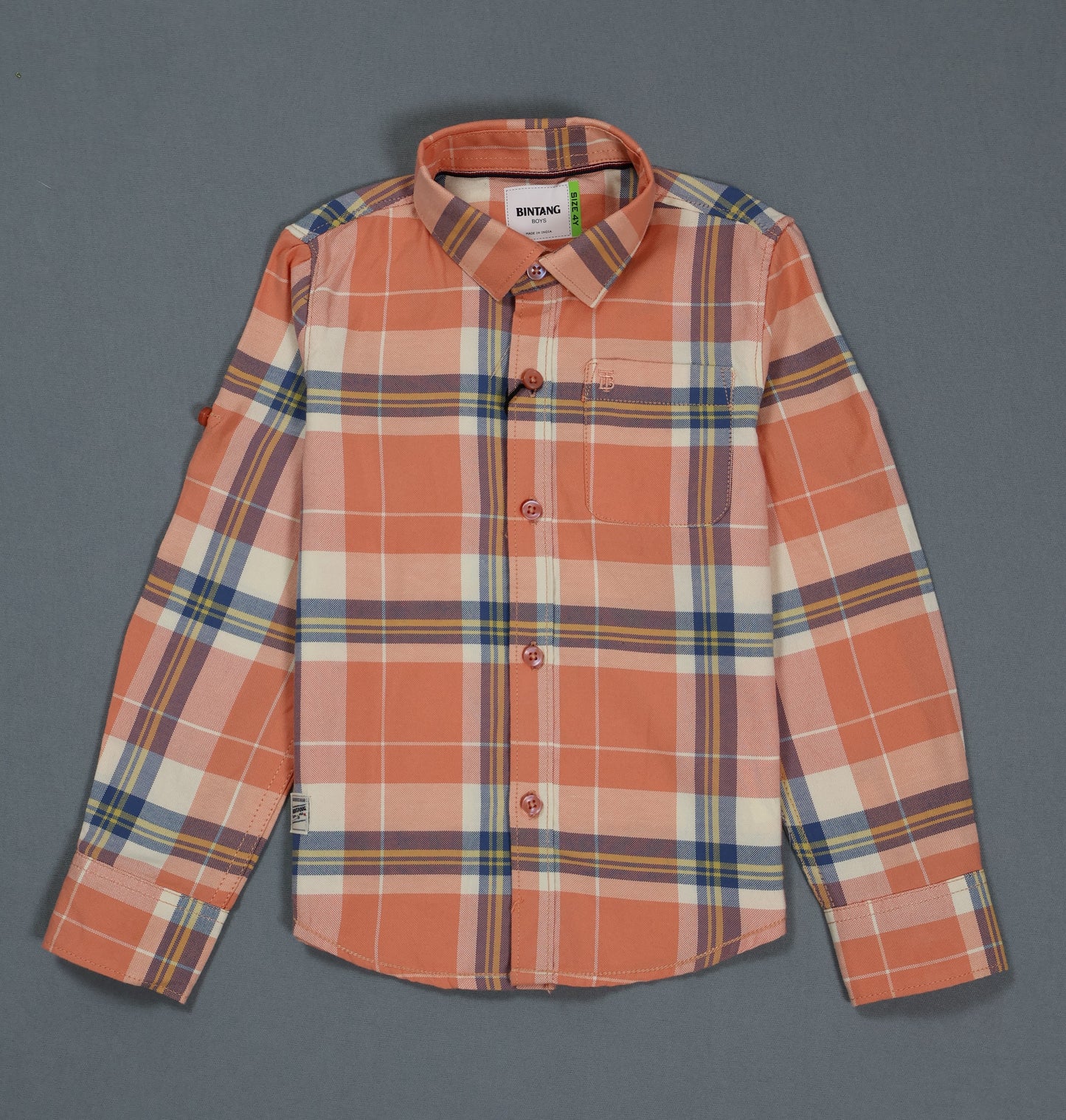 Plaid shirt with a visible brand label on a gray background