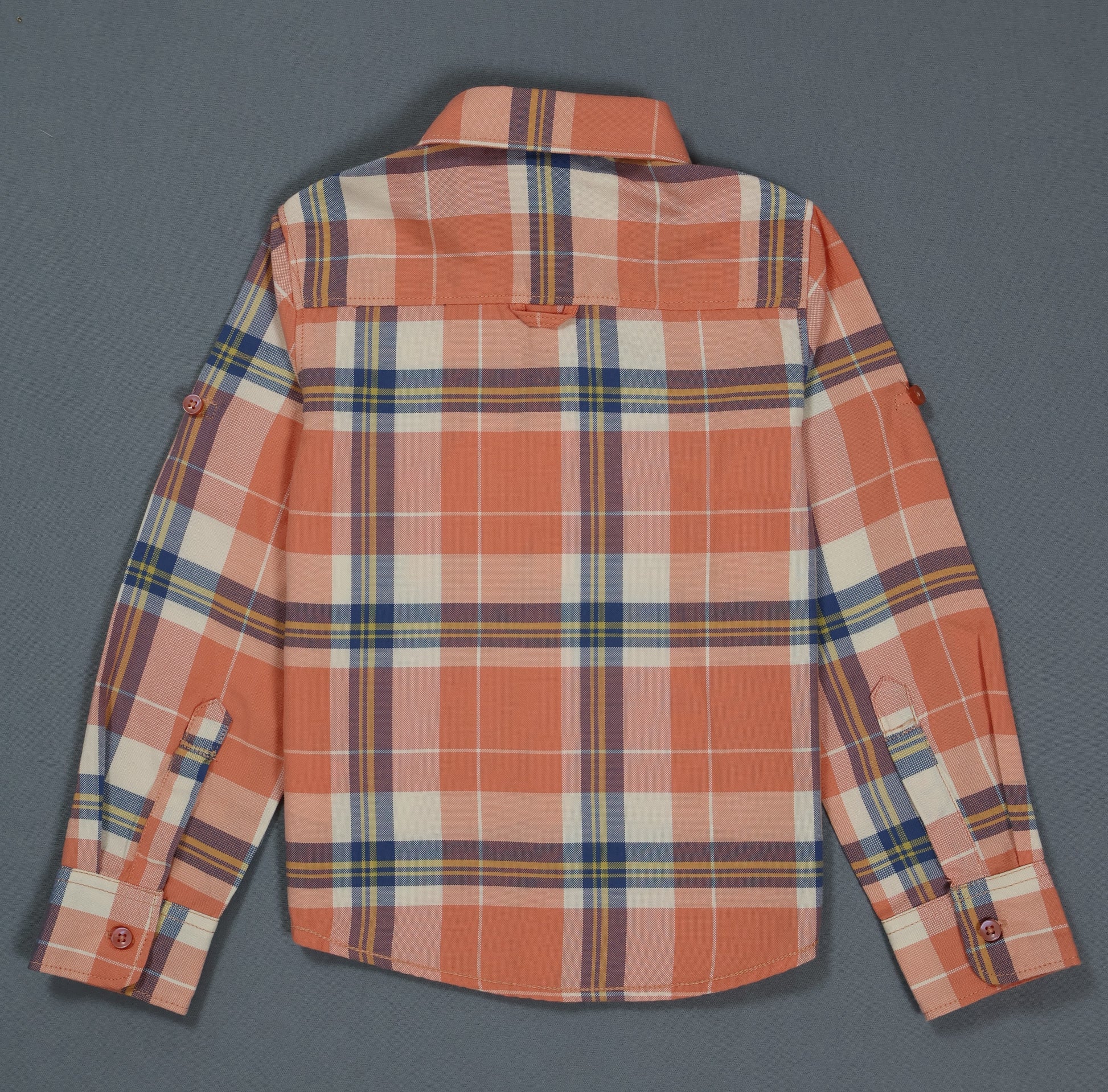 Plaid shirt with orange and blue pattern on a gray background