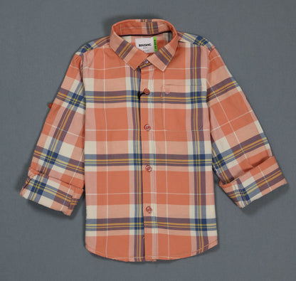 Plaid shirt with a brand label on a gray background