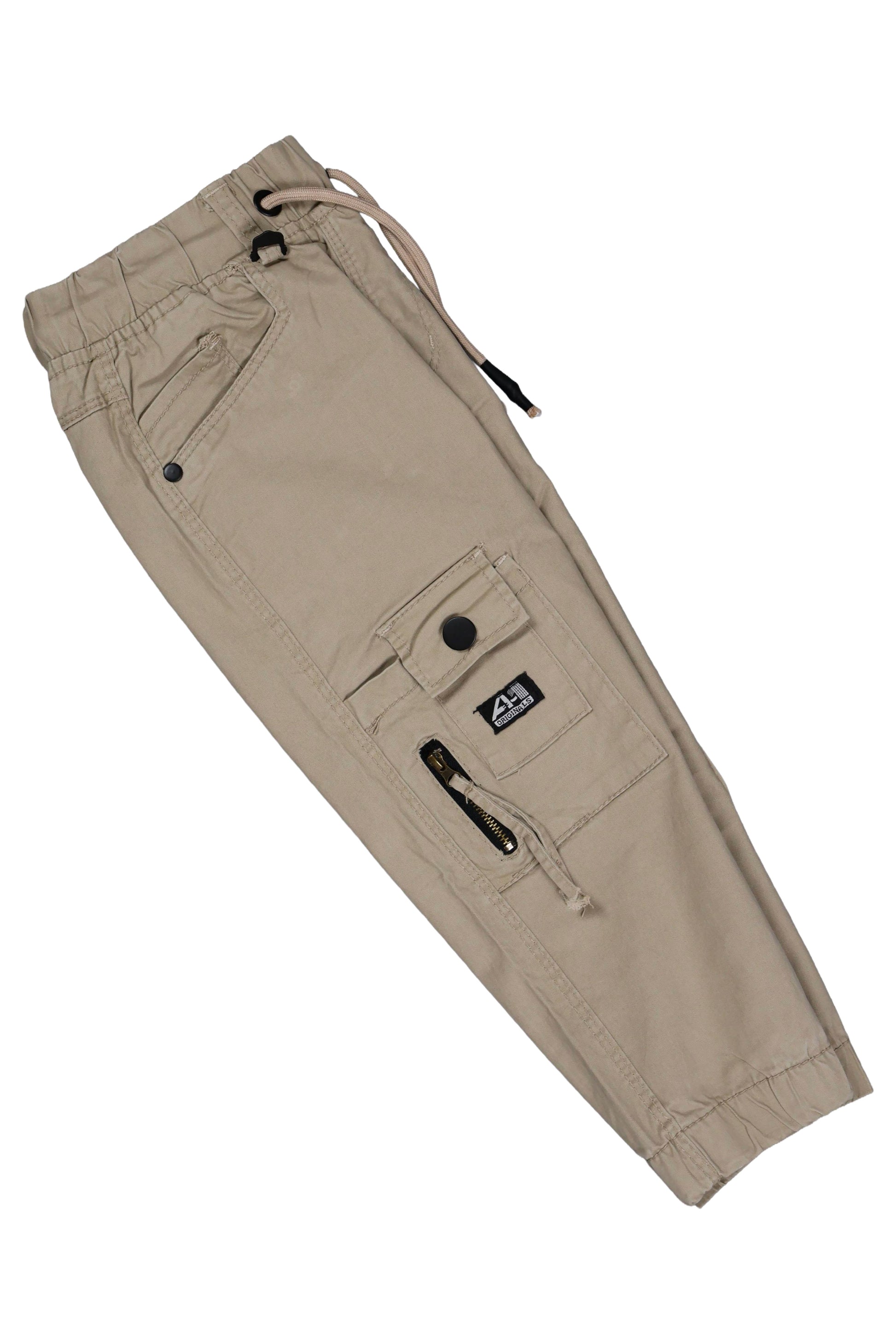 Beige pants with multiple pockets and zippers on a white background