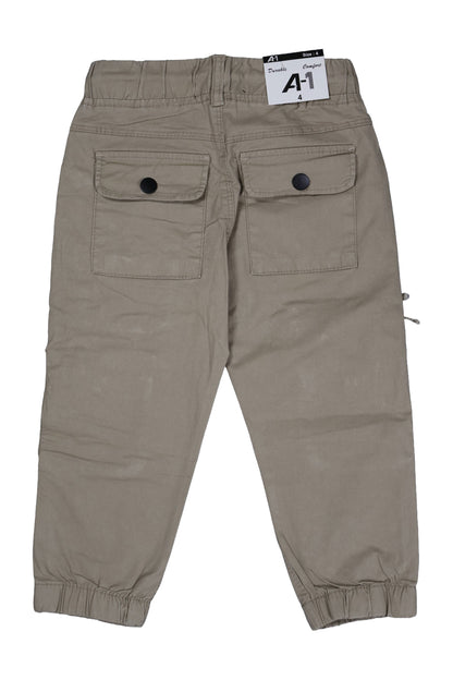 Beige pants with two front pockets on a white background