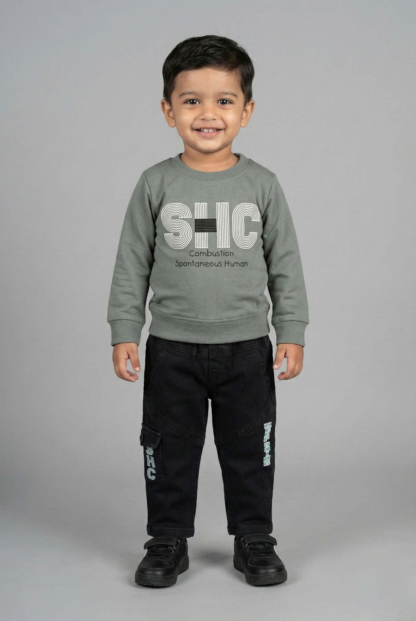 Fyst boys' two-piece clothing set featuring a grey typography print sweatshirt and matching black joggers.