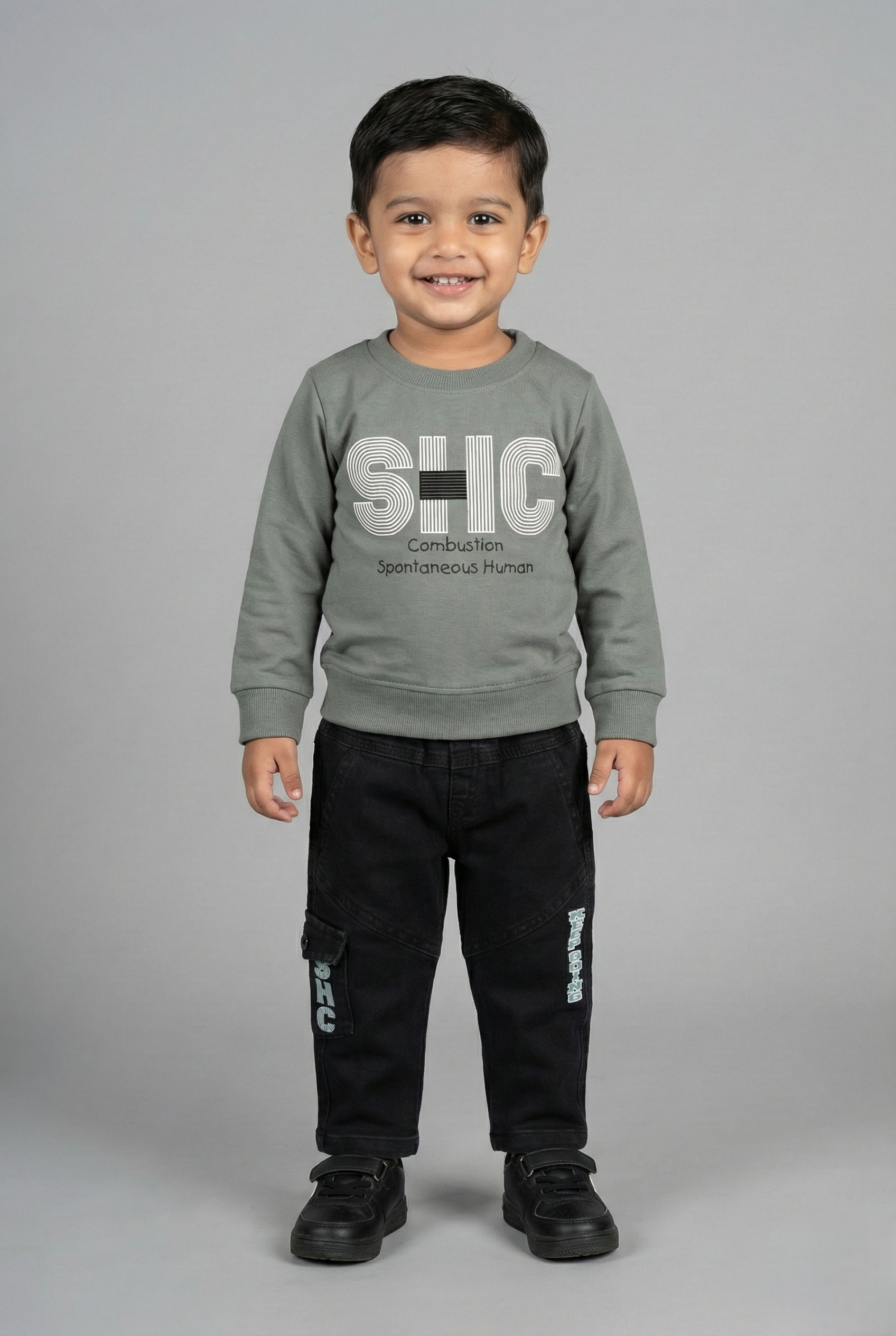 Fyst boys' two-piece clothing set featuring a grey typography print sweatshirt and matching black joggers.